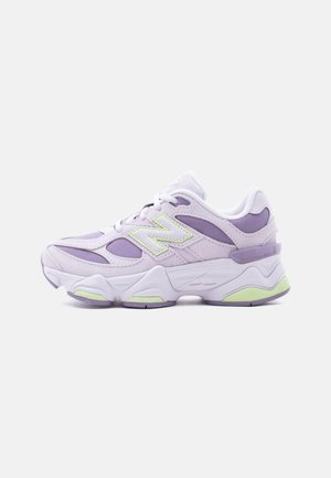 Light purple and white athletic sneaker with mesh and suede details, chunky sole, and a prominent "N" logo on the side.