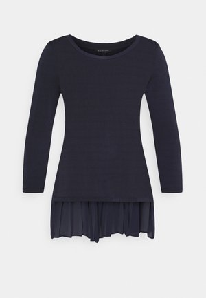 Langærmet mørkeblå damebluse med rund halsudskæring og en plisseret chiffon-forkant.
