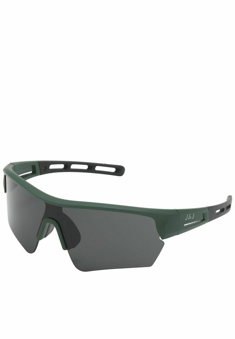 Grüne Sportsonnenbrille mit großen, gewölbten Gläsern, strukturierten Rahmen und Ausschnitten an den Bügeln zur Belüftung. Dunkel getönte Gläser.