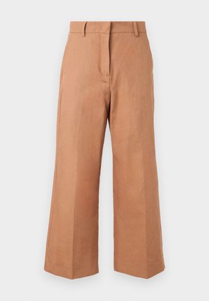 Luchtige, hoge taille broek in beige met wijde pijpen, voorzien van riemlussen en een ritssluiting aan de voorkant, afgebeeld tegen een eenvoudige witte achtergrond.