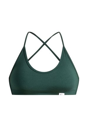Reggiseno sportivo verde con forma triangolare, spalline incrociate sul retro e texture liscia; presenta un'etichetta con logo sulla fascia.