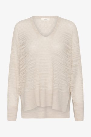 Pull en maille texturée beige clair avec col en V, manches longues et ourlet côtelé, conçu pour une coupe décontractée.