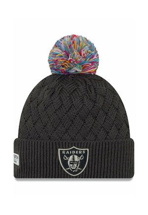 Knitted black beanie with a colorful pom-pom on top, featuring a Raiders logo patch on the front and ribbed cuff at the base.
