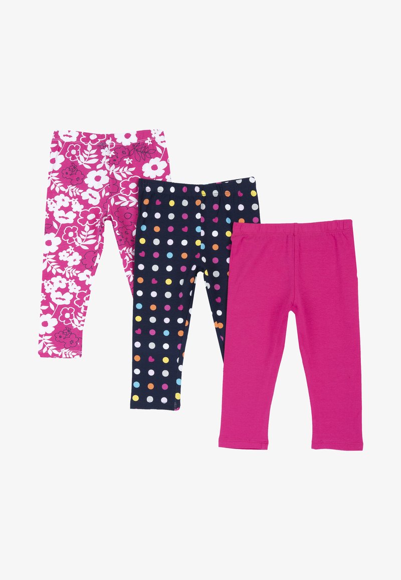 Tres pares de leggins para niños: uno con estampado floral en rosa, otro azul marino con lunares multicolores, y uno liso en rosa. Cinturas suaves y elásticas.