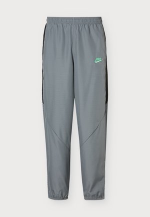 Nike Performance, Долнище на анцуг - cool grey/black/illusion green