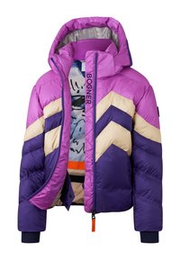 Purple and pink puffer jacket with geometric chevron pattern in cream and dark purple, featuring a hood and bold branding on the zipper.