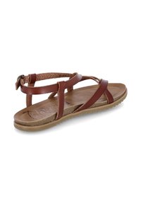 Brown leather sandal with multiple straps, a textured insole, and a rubber sole. Features adjustable back strap for a secure fit.