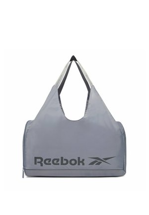 Szara torba sportowa Reebok z podwójnymi uchwytami, logo z przodu oraz zamykana na zamek kieszeń na dole, pokazana na białym tle.