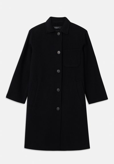 Black wool coat with a straight cut, button closure, and a single chest pocket. Features side pockets and three-quarter sleeves.