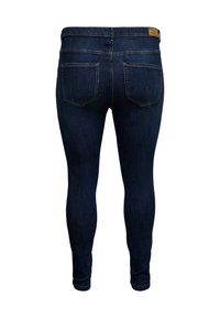 Donkerblauwe skinny jeans van denim met een gladde textuur, een aangesloten pasvorm, twee achterzakken en een leren applicatie bij de taille.