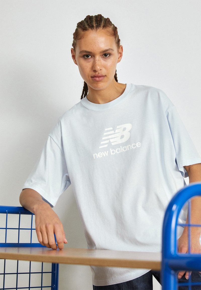 New Balance Tshirt z nadrukiem/jasnoniebieski Zalando.pl