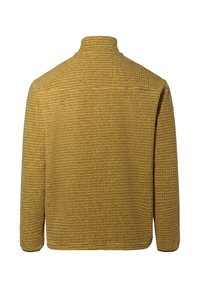 Giacca strutturata di color giallo senape con colletto alto, maniche lunghe e taglio rettangolare. Presenta un motivo intrecciato e accenti di colore uniforme.
