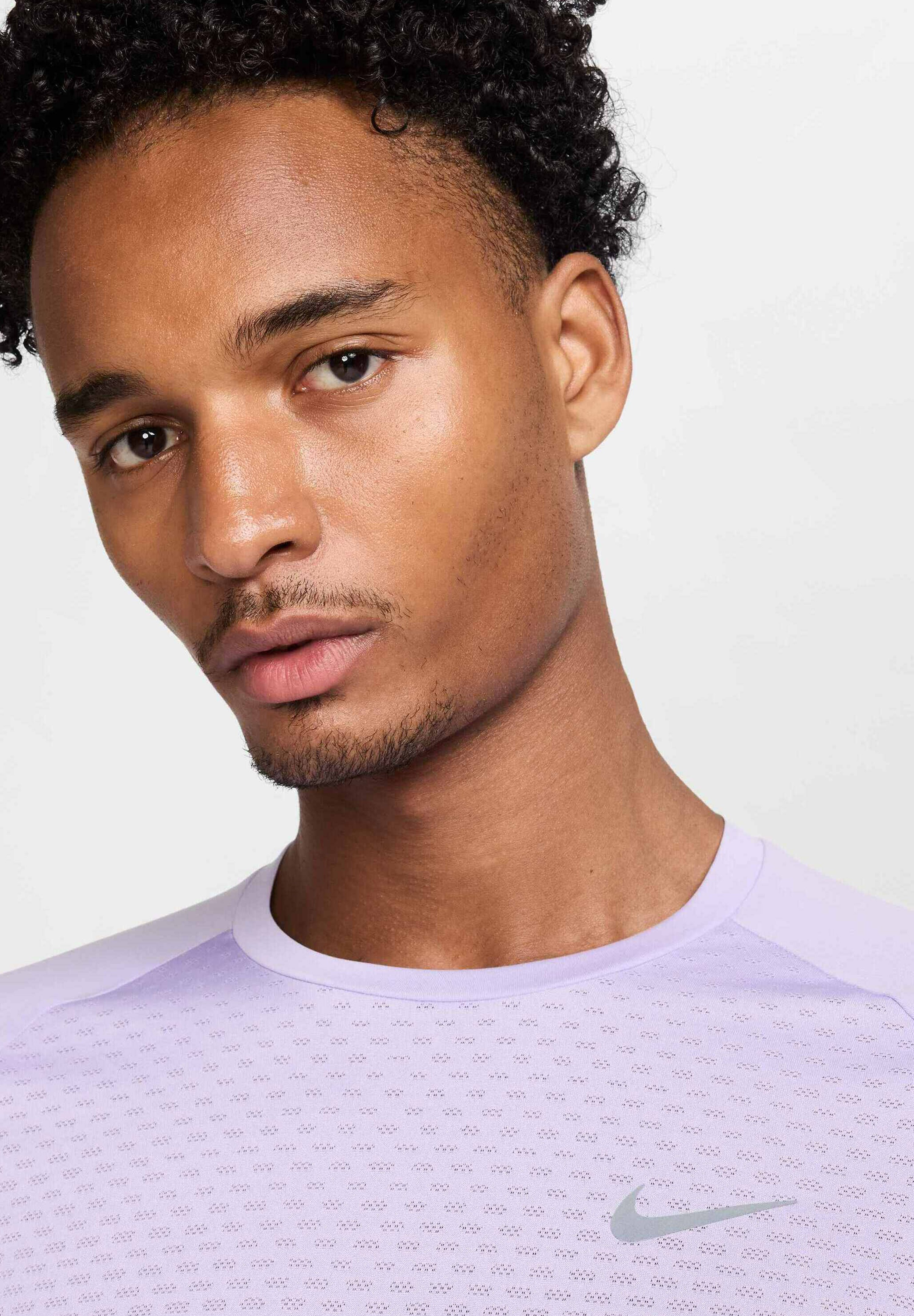 have a nike day shirt purple