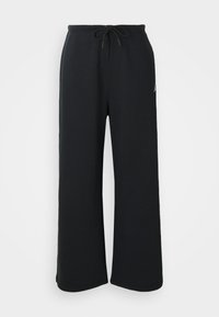 Pantaloni sportivi neri a gamba larga con cintura elastica e cordino, caratterizzati da un piccolo logo bianco sull'anca destra.