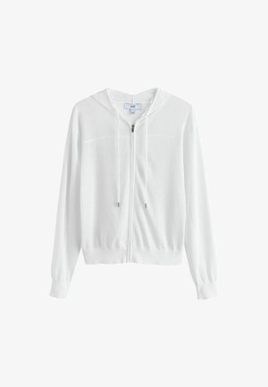 Valge pika varrukaga lukuga kapuutsiga pusa esikäänte ja soonikkoes mansettidega, esitatud tavalise valge tausta ees.