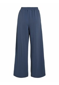 Wijdelijkige broek in een effen donkerblauwe kleur. Gemaakt van zachte stof met een elastische tailleband, met een gladde textuur en zonder zichtbare patronen.