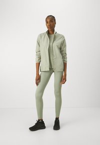 ASICS ICON TIGHT - Leggings - olive grey/mantle green