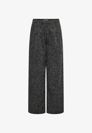 Pantalon large en matériau noir et gris chiné, avec une surface texturée et une taille élastique.