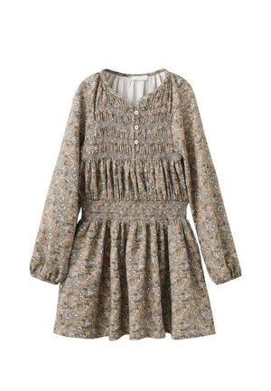 Robe fleurie marron avec des manches longues, buste smocké, détail de boutons, et jupe évasée. Présente des motifs de petites fleurs multicolores.
