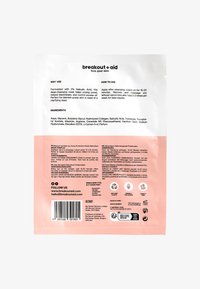 Helles pinkfarbenes Verpackung mit einem weißen oberen Bereich, der schwarzen Text zeigt. Enthält detaillierte Informationen zur Anwendung und zu den Inhaltsstoffen. Sieht aus wie eine kosmetische Maske.