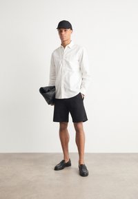 HUGO Pantalon de survêtement - black