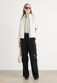 Calvin Klein Jeans RETRO TRACK JACKET - Training jacket - tofu