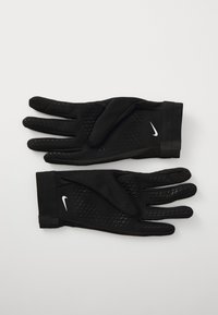 Czarne rękawiczki z teksturowaną powierzchnią, z dopasowanym krojem i mankietem na nadgarstek. Wyraźne logo Nike w białym kolorze po boku.