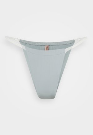 Light blue thong underwear with a smooth texture, featuring a sheer mesh waistband and minimal coverage design.