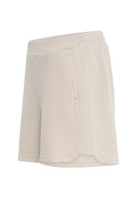 Shorts en tissu beige texturé avec taille élastique et poches latérales, avec un ourlet incurvé sur fond blanc.