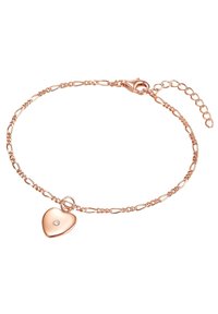 Pulsera de oro rosado con un diseño de cadena alargada, que presenta un charm en forma de corazón con una pequeña piedra transparente. Cierre ajustable.