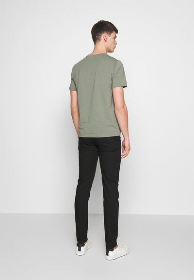 Won Hundred DEAN A STAY  - Vaqueros slim fit - stay black