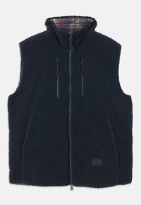 Gilet en polaire bleu marine avec un extérieur doux et texturé, fermeture éclair sur le devant, deux poches zippées et un intérieur en tartan au niveau du col. Étiquette avec logo sur le devant.