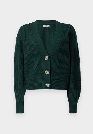 Grüne gestrickte Strickjacke mit tiefem V-Ausschnitt, vier großen Knöpfen und geripptem Muster. Verfügt über lange Ärmel und einen verkürzten Schnitt.