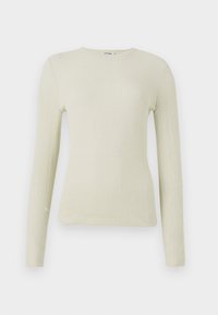 Langermet, tettsittende topp i lys grønn teksturert stoff med rund hals. Jevn overflate med subtile ribber, ingen synlig maskinvare eller detaljer.