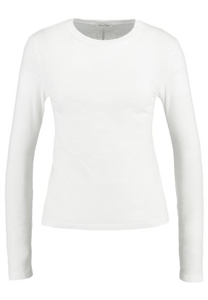 White long-sleeve t-shirt made of soft cotton. Features a crew neckline and a fitted design with no patterns or embellishments.