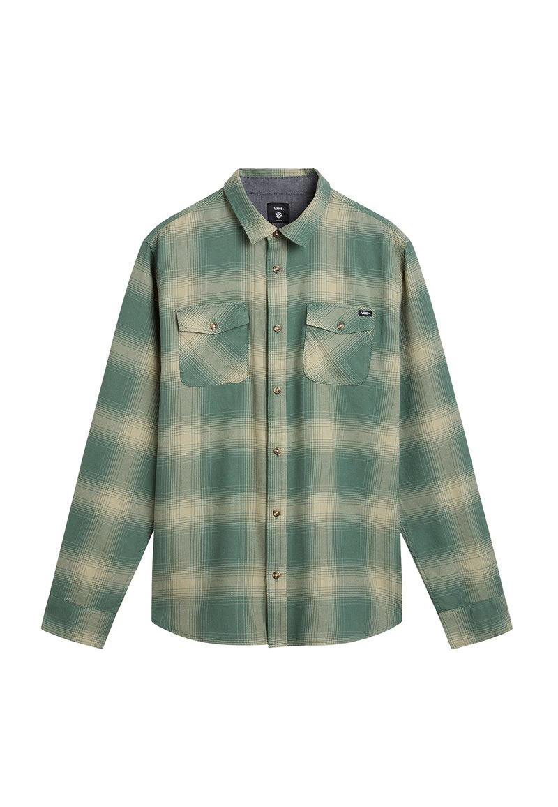Long-sleeve plaid shirt in green and beige, made of soft fabric. Features two chest pockets and a button-up front with metal buttons.