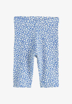 Leggings a lunghezza ginocchio con motivo floreale blu e bianco, dotati di vita elasticizzata, progettati per bambini.