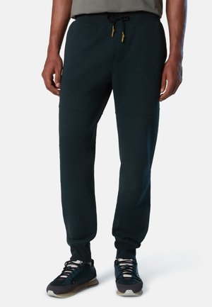 ZIPPER POCKET - Pantaloni sportivi - midnight green