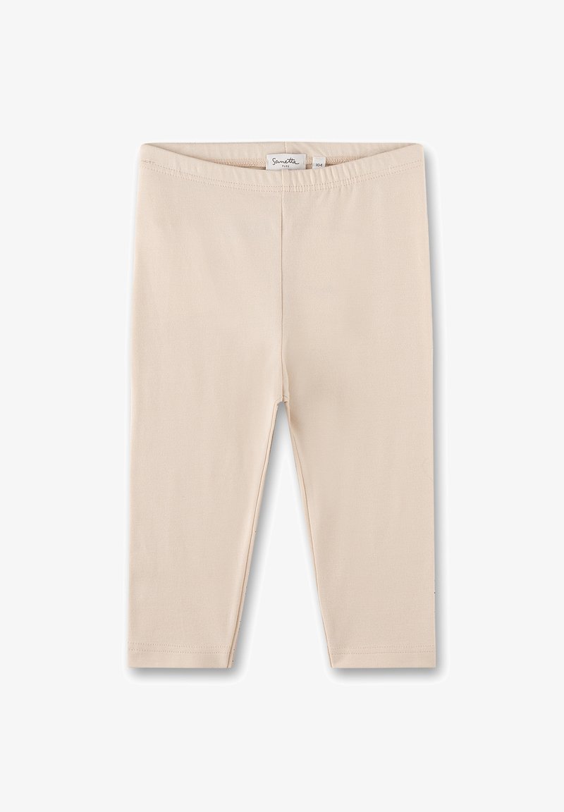 Beige Baumwollleggings mit einer weichen, dehnbaren Textur, ausgestattet mit einem elastischen Taillenbund und ohne sichtbare Muster oder Akzente.