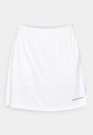 White athletic skirt with a smooth texture, a wide waistband, and a logo in the lower right corner. Features a loose fit for comfort.