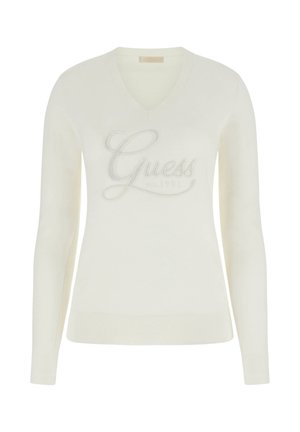 Maglione a scollo a V color avorio realizzato in tessuto morbido con maniche lunghe; presenta il logo "Guess est. 1981" ricamato in argento sul petto.
