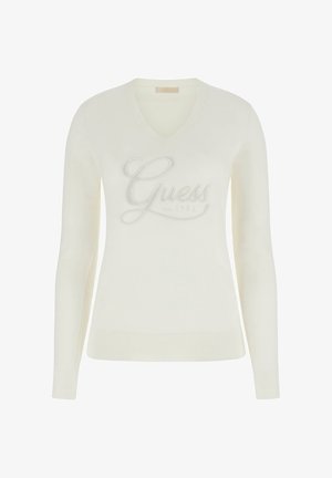 Roomwit v-hals trui gemaakt van zachte stof met lange mouwen; met zilverkleurig geborduurd logo "Guess est. 1981" op de borst.