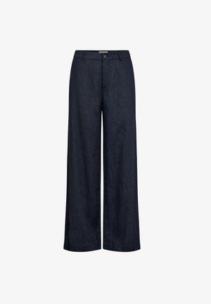 Mörkblå vida byxor i lätt linne. Har knappstängning, bälteshällor och en jämn, texturerad yta.