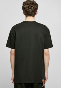 Forgotten Faces OVERGROWN HEAVY OVERSIZED TEE UNISEX  - T-shirts med print - black