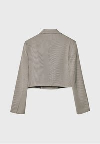 Cropped jacket, black and white checkered pattern, notched lapels, long sleeves, smooth texture, and open front design.