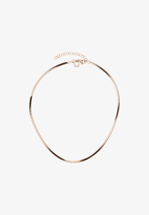 Collier chaîne fine en or avec fermoir à homard et chaîne rallonge réglable sur fond blanc.