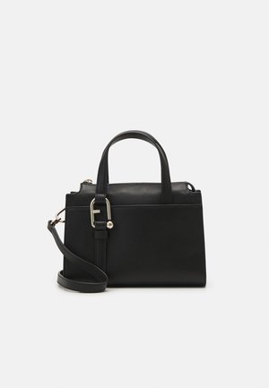 Black leather handbag with a structured design, two short handles, removable shoulder strap, and silver hardware accents. Smooth texture.