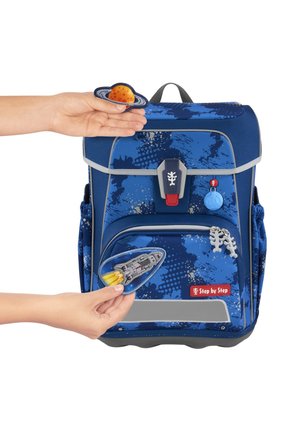 Blue children's backpack with space-themed patches; features a textured fabric, gray accents, and a secure closure. Adjustable side pocket included.