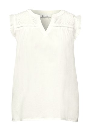 Weiße ärmellose Bluse mit V-Ausschnitt, Spitzenpasse mit floralen Ausschnitten und dezenten Rüschen an den Schulternähten.