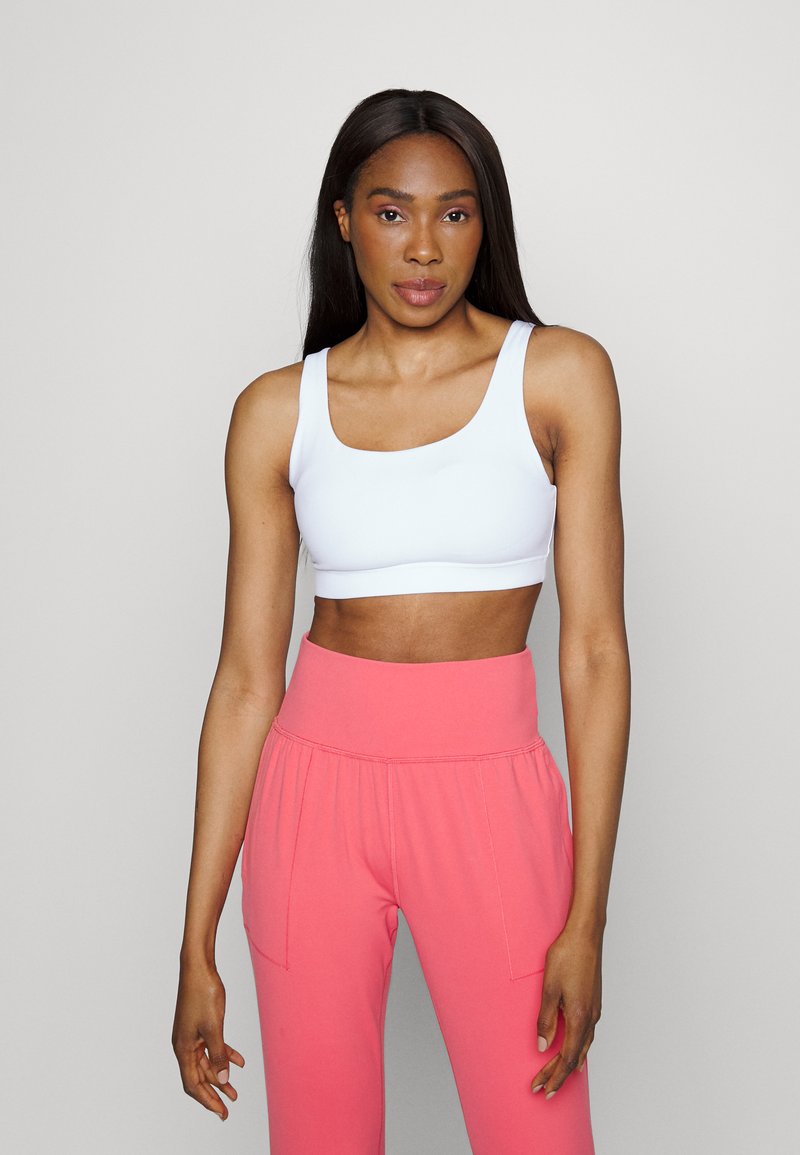 Athleta EXHALE BRA D-DD - Sutiã desportivo de suporte ligeiro - white
